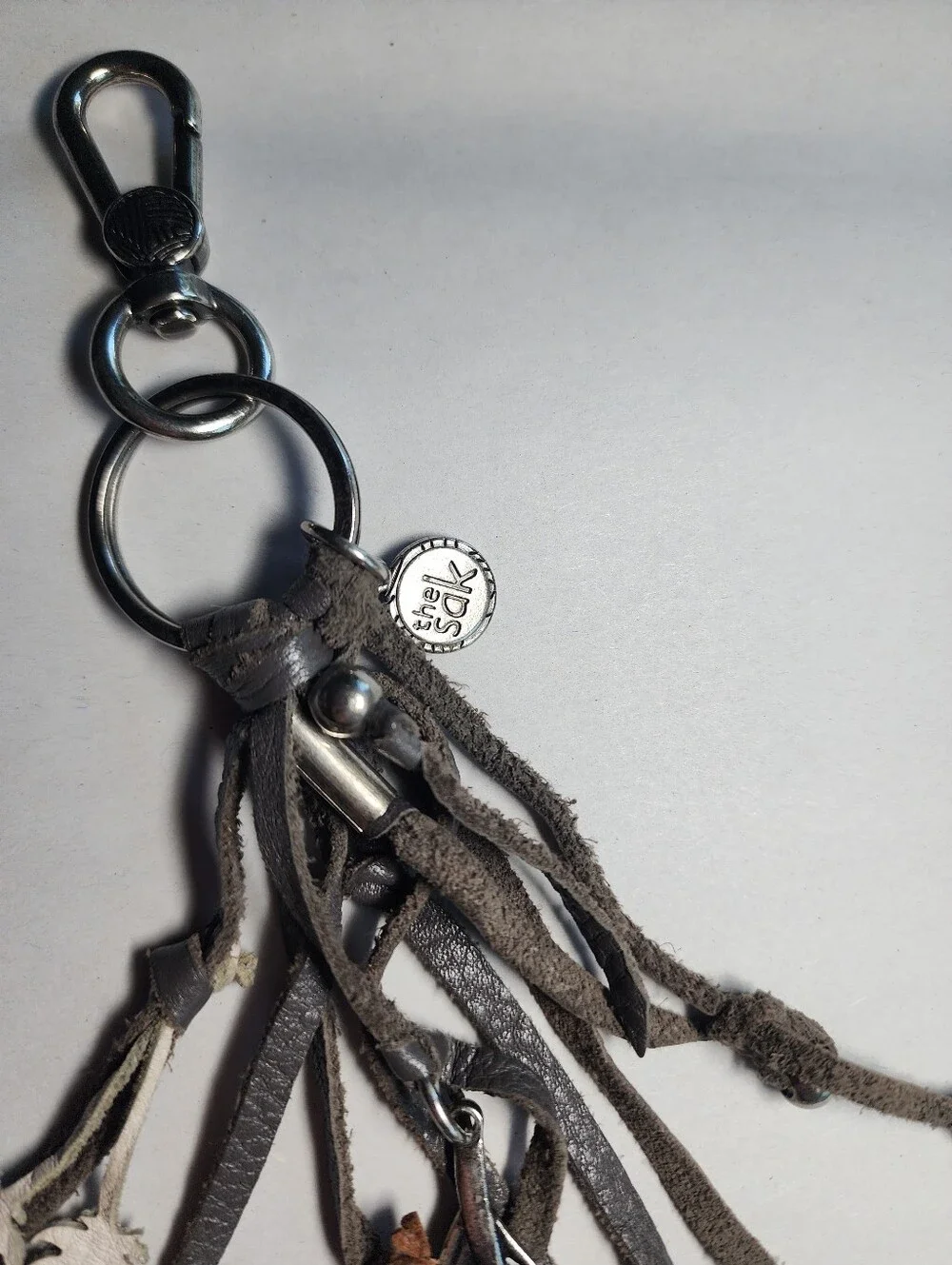 The Sak Leather Feather Tassel Keychain Charm Gray, White & Brown Bohemian